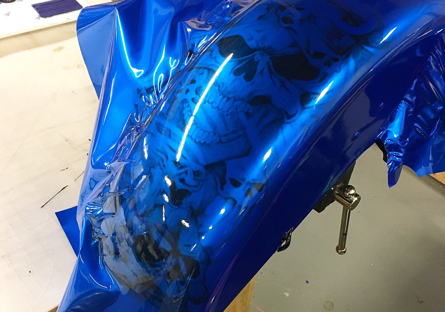 Candy blue chrome wrap on a custom fender — NIKO Signs & GraFX, serving Elora