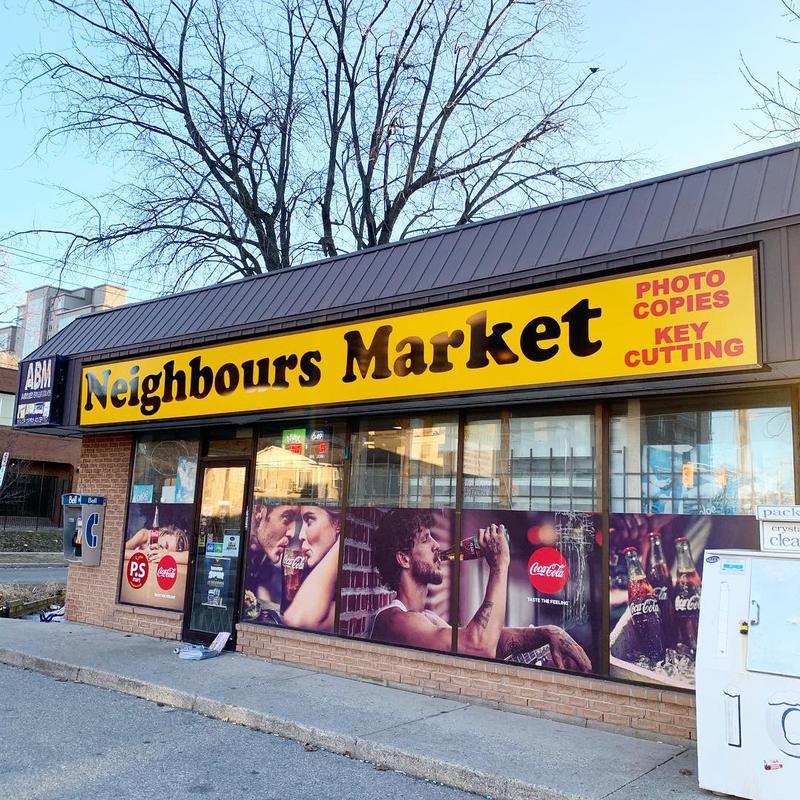 Neighbours Market — Storefront Sign